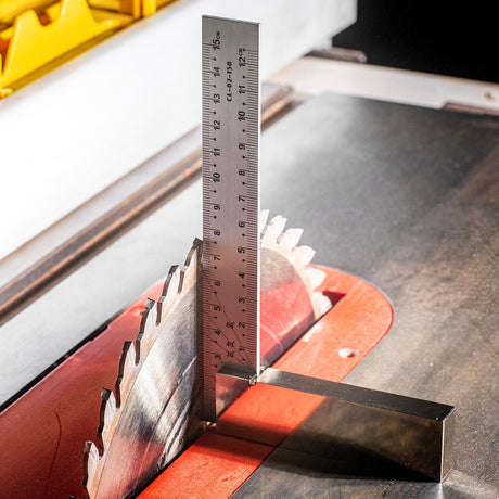 Stainless steel magnetic base try square with metric and imperial scale, showing the square placed securely on a workpiece