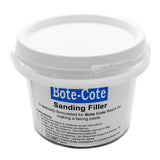 Bote-Cote Lightweight Sanding Filler powder being mixed with epoxy resin paste