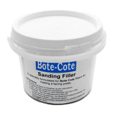 Bote-Cote Lightweight Sanding Filler powder being mixed with epoxy resin for fairing and creating a smooth finish