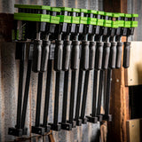 Torquata Set of 12 Parallel Clamps and Steel Wall Mounted Clamp Rack in workshop setting