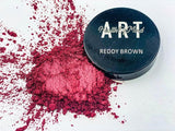 Health of Mind Art Reddy Brown 50g Pearlescent Pigment Mica Powder for Epoxy Resin displayed on wooden surface