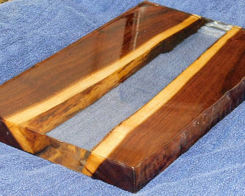 LuciClear river table resin casting with blue background