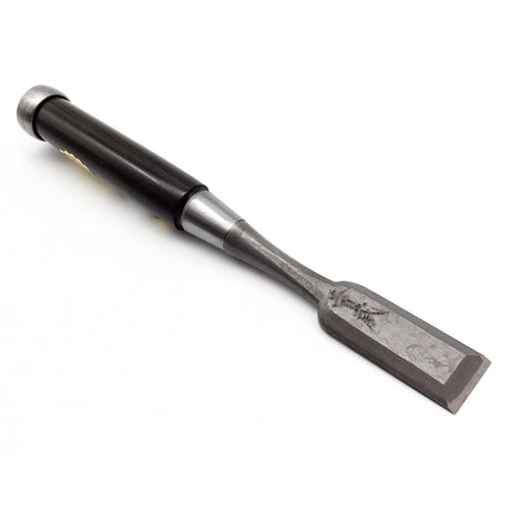 Japanese Damascus steel woodworking chisel with ebony handle showcasing exquisite craftsmanship