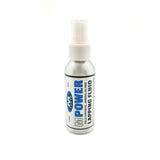MPOWER Synthetic Lapping Fluid bottle with workshop equipment in background
