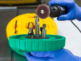 MicroJig BLADECLEAN Saw Blade & Router Bit Cleaning System in use on circular saw blade