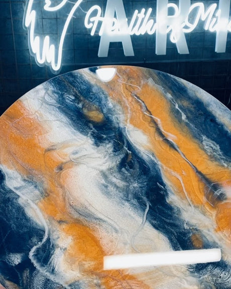 Clear resin showcasing smooth finish with minimal bubbles for artwork or table coating