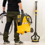 Mirka Dust Extractor 1125 L PC in woodshop setting with hose attached