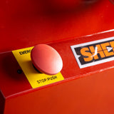Sherwood 12in Heavy-Duty Table Saw with Dado Kit and Dust Guard in use with panel attachment at woodworking shop