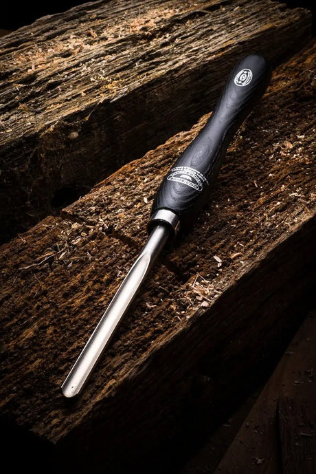 Crown 13mm M2 Cryogenic Steel Spindle Gouge woodturning tool in action on timber