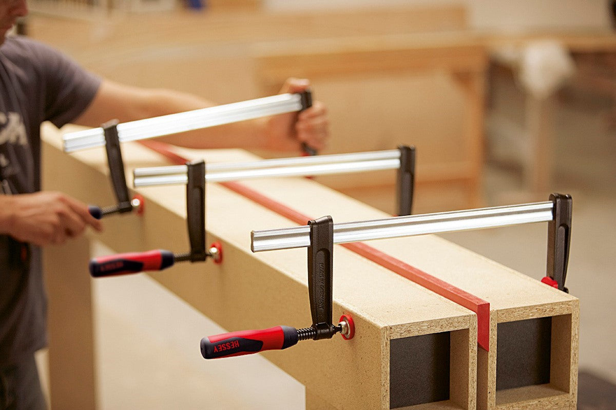Bessey Set of 4 Quick Action Clamps TG Series, 400mm Capacity, Soft Grip Handle in use on woodworking project