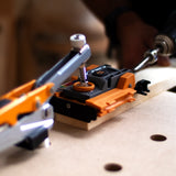 Compact self-adjusting pocket hole jig for wood joinery solution, angled view, BORA Tool Automatic Mini Pocket Hole Jig