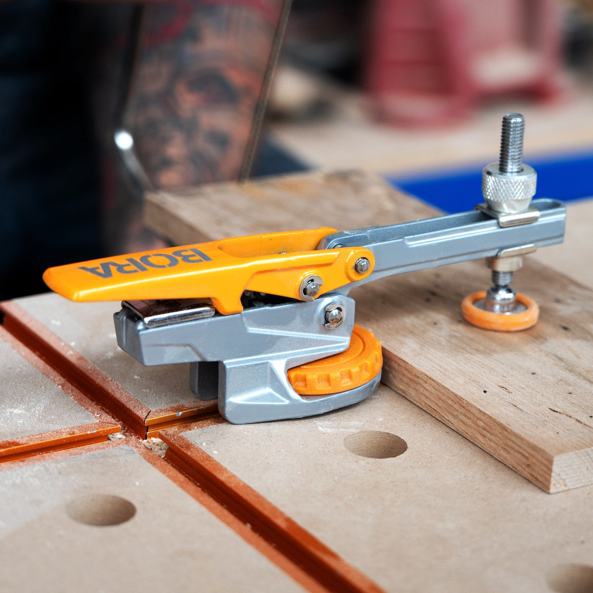 BORA Tool Auto Adjust T-Track Standard Toggle Clamp in use on woodworking project