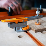 BORA Tool Auto Adjust T-Track Standard Toggle Clamp in use on workbench