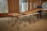 BORA Centipede Work Stand set up outdoors showcasing its portability and durability