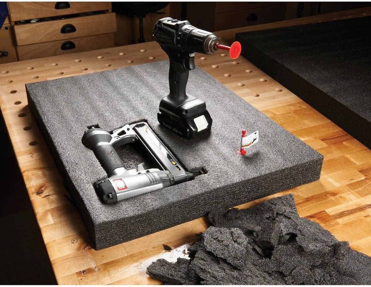 FastCap Kaizen Foam Spinner Set of Two Levelling Tools in use with a drill, smoothing cutouts in foam