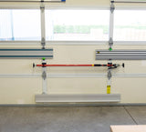 FastCap 3rd Hand Rack Mountable Holder being installed on a workshop wall