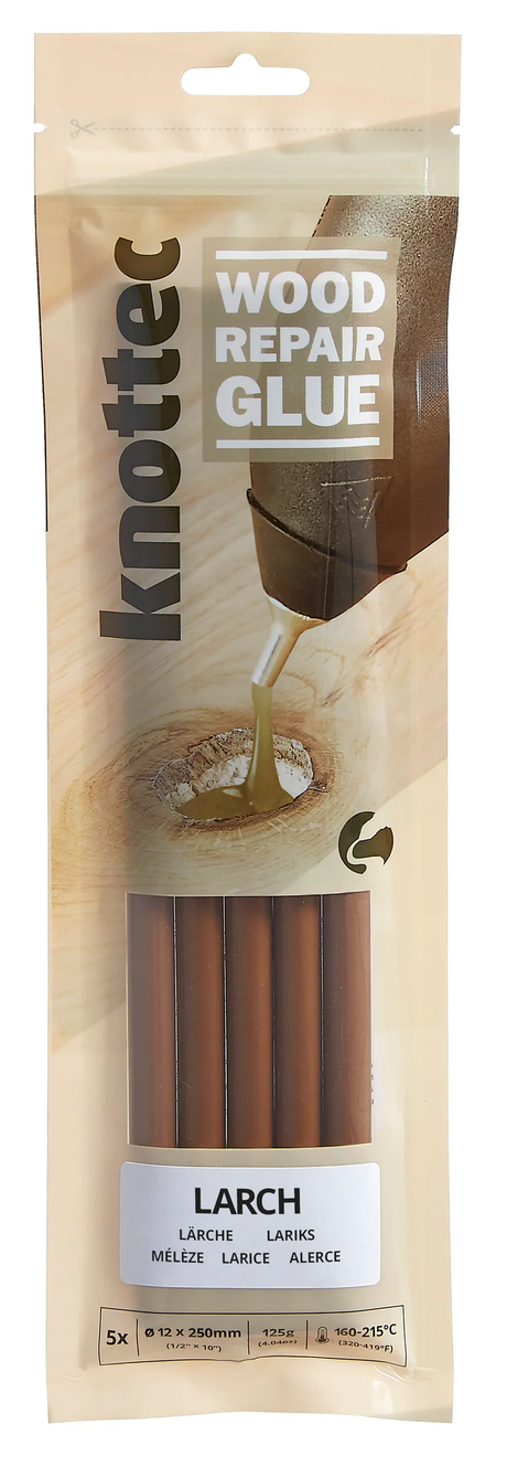 Power Adhesives Knottec Wood Knot Filler Glue Sticks 12mm Larch Hot Glue Pack of 5 in use on damaged wood surface