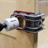Milescraft LockMatePLUS self-clamping jig in use on a door for quick and accurate lock & knob installation