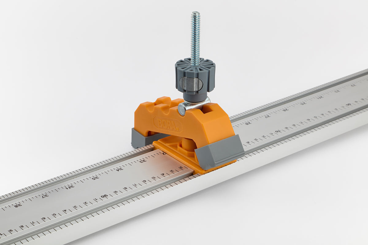 BORA NGX Track Clamp Pair in use with saw guide, providing precise angle cutting capabilities