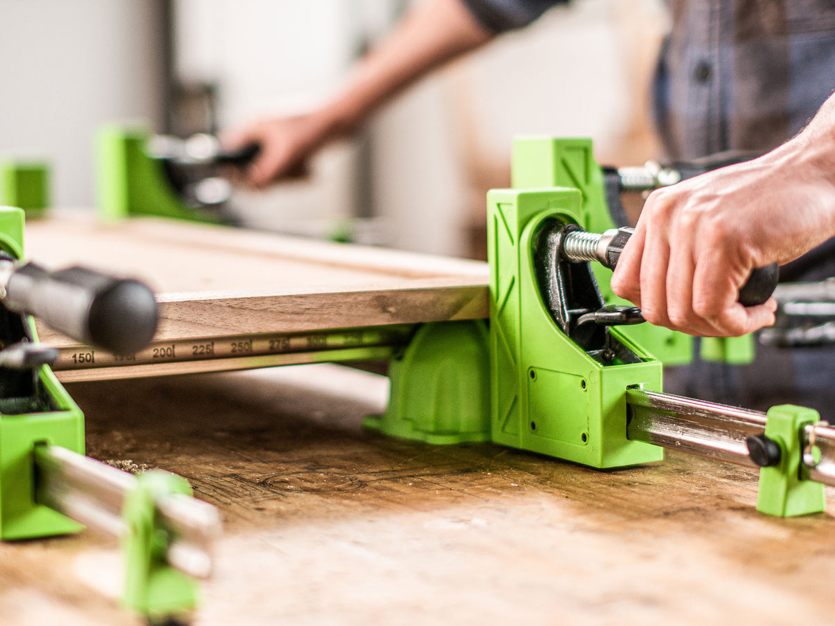 Torquata 600mm Parallel Clamp in use, securing wood panels with precision