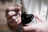 1/8in x 1/2in Up-Spiral Flat CNC Router Bit in action, ideal for fine detail woodworking with solid carbide composition