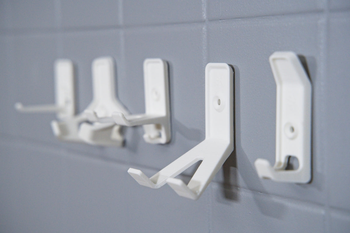 Tech Hook White 3 Pack with Reinforced Twin Arms and Sloped Prongs, ideal for holding cables, phone, or tools