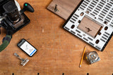 Shaper Plate Bundle lifestyle image showcasing handheld CNC router and universal template in action