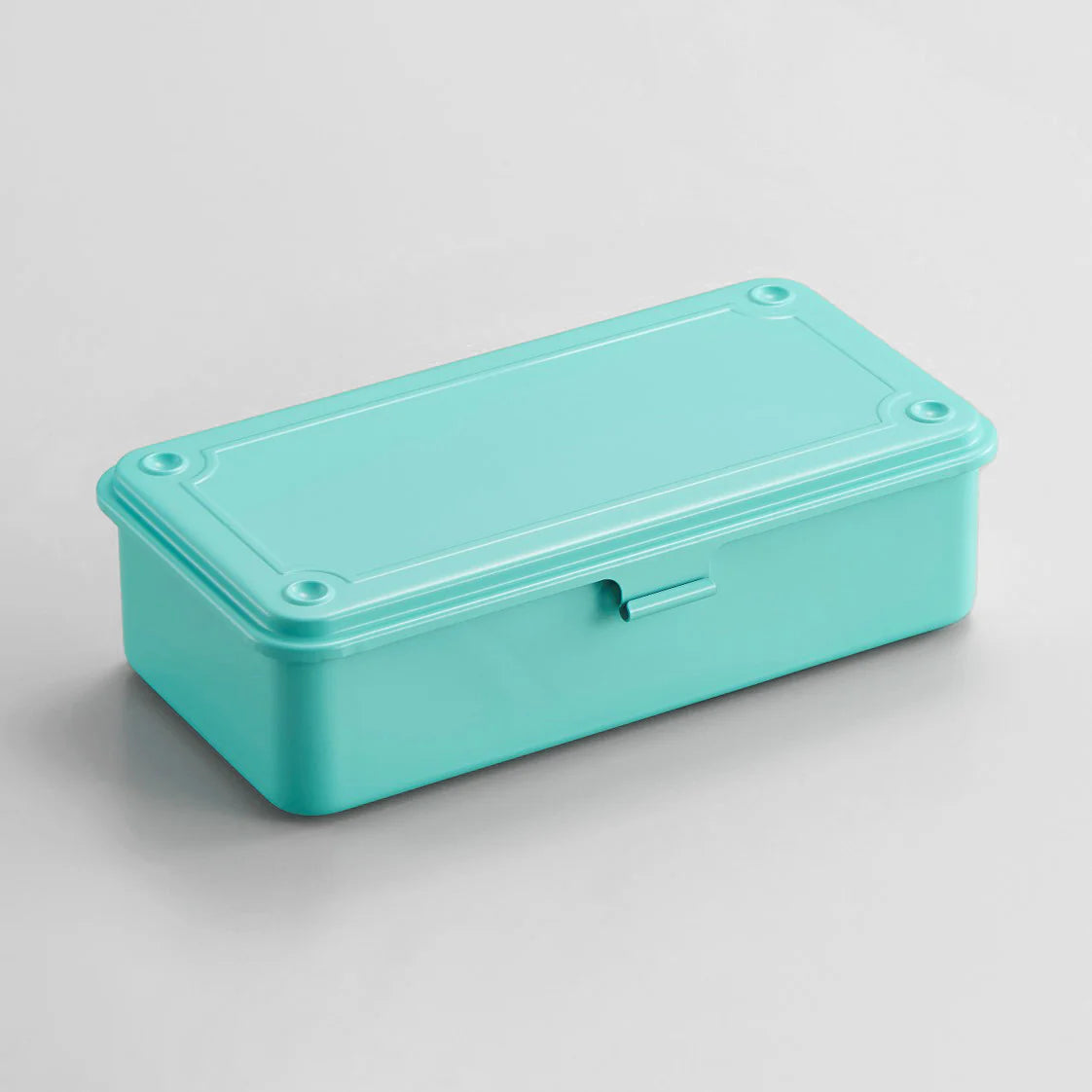 Toyo Trunk Shape Toolbox 19cm in matte black finish with brass accents, showcasing the top handle detail