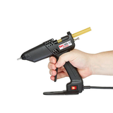 Power Adhesives Knottec Wood Repair Kit hot glue gun applicator in use on a timber surface