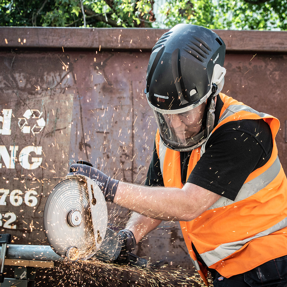 Heavy duty Trend Airshield Pro face shield respirator dust mask in action during woodworking