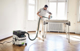 Festool CTM MIDI-I 15L M Class Dust Extractor in use with smooth suction hose and tool storage area