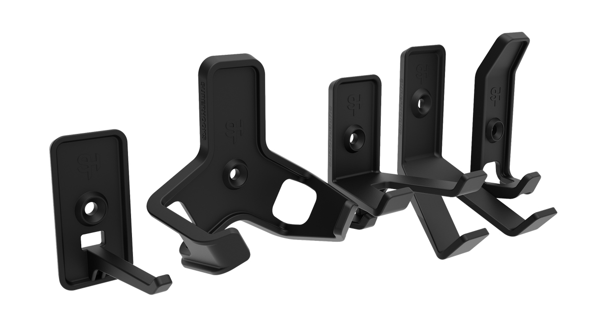 Superhooks Garage Bundle 27-Piece Black Modular Tool Wall Hooks on display in a lineup
