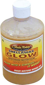 U Beaut Shellawax Glow Friction Polish 500mL bottle on a rustic wooden surface