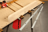 INCRA Mitre Slide Aluminium in action on a 19mm track, showcasing precision woodworking tool capability