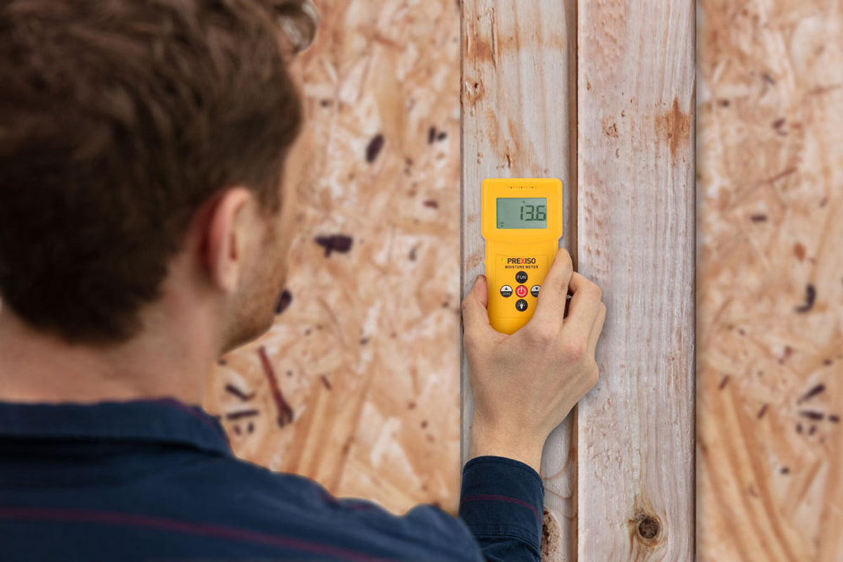 Prexiso Moisture Meter Pinless Inductive in use on timber surface