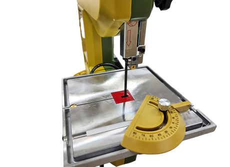 PROXXON MBS-240/E 6.5in Micro Bandsaw cutting wood at an angle
