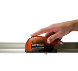 SafeCut Mouse Cutter in action, providing precise cuts along the edge of a ruler. Perfect for paper, veneer, and edge banding