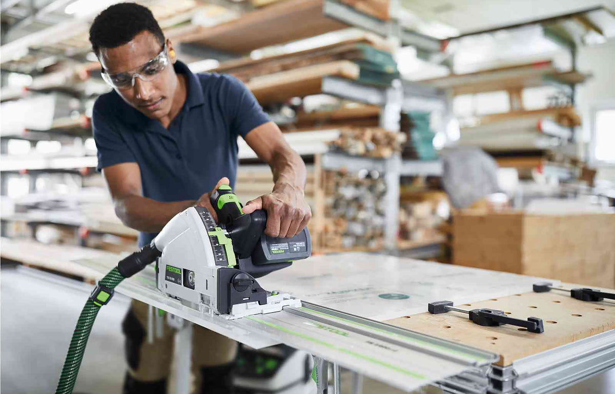 Festool TSC 55K cordless plunge saw with 1400mm rails and 100 Year Limited Edition Systainer in use on a woodworking project