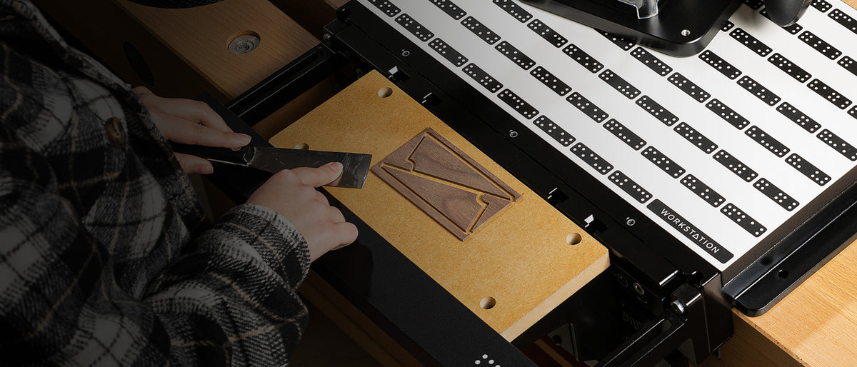 Shaper Tools Origin Handheld CNC Router with Workstation in use